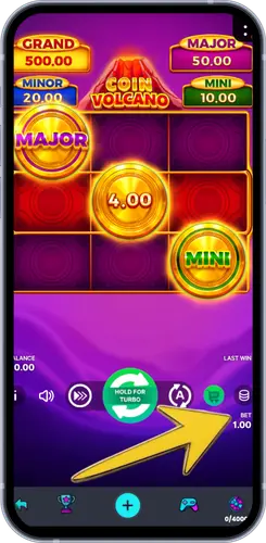 Coin Volcano game screen with an arrow pointing to the bet amount button